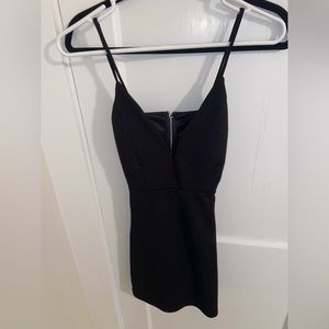 Black formal dress. Windsor. Back cut out. Shiny. Worn once. Like new